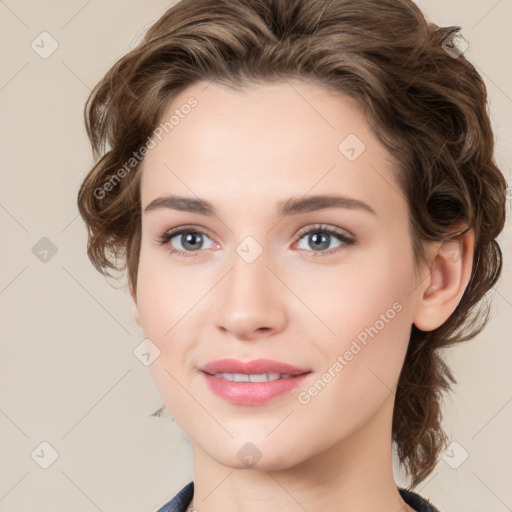 Joyful white young-adult female with medium  brown hair and green eyes