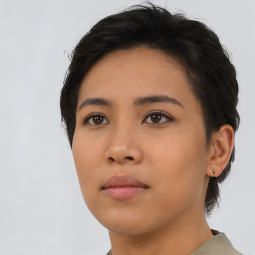 Neutral asian young-adult female with short  brown hair and brown eyes
