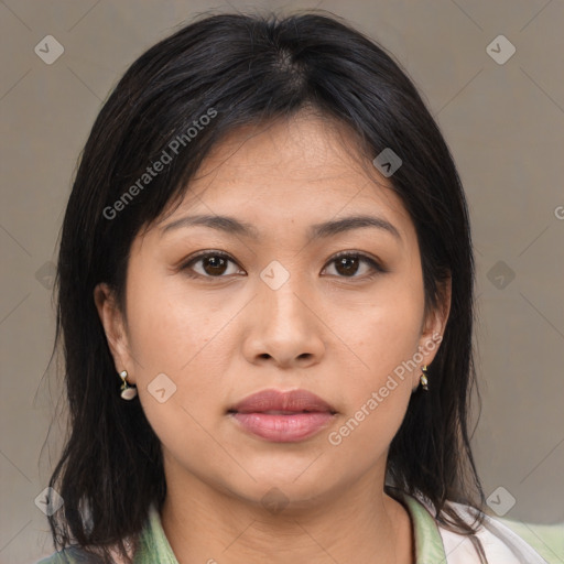 Joyful asian young-adult female with medium  brown hair and brown eyes