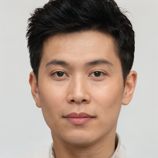 Neutral asian young-adult male with short  black hair and brown eyes