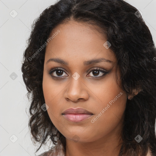 Joyful black young-adult female with long  brown hair and brown eyes