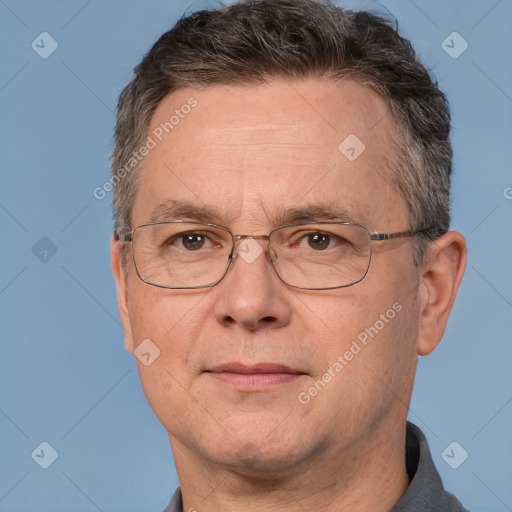 Joyful white middle-aged male with short  brown hair and brown eyes