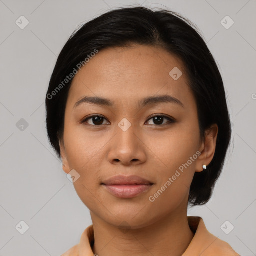 Joyful asian young-adult female with medium  black hair and brown eyes