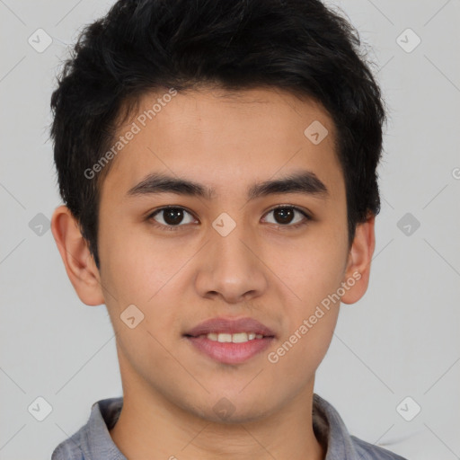 Joyful latino young-adult male with short  brown hair and brown eyes