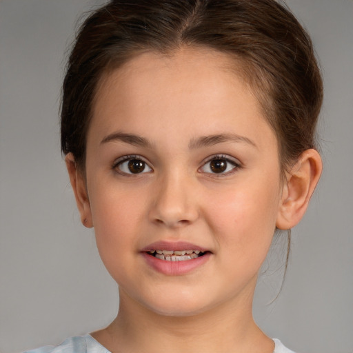 Joyful white child female with medium  brown hair and brown eyes