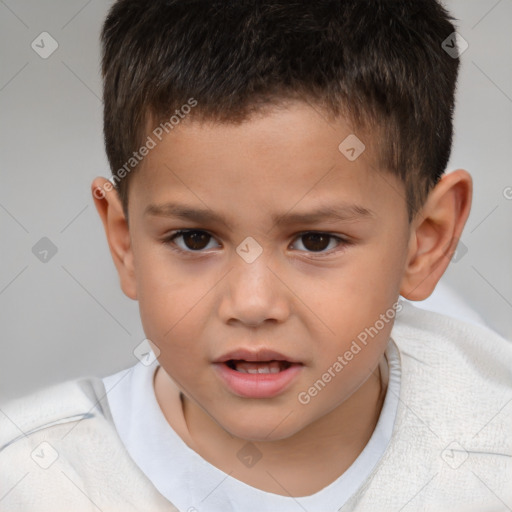 Joyful white child male with short  brown hair and brown eyes