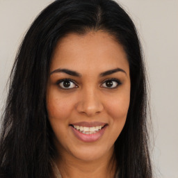 Joyful asian young-adult female with long  brown hair and brown eyes