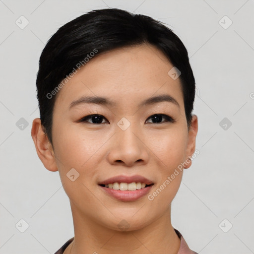 Joyful asian young-adult female with short  black hair and brown eyes