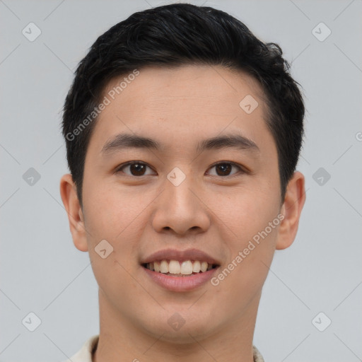 Joyful asian young-adult male with short  brown hair and brown eyes