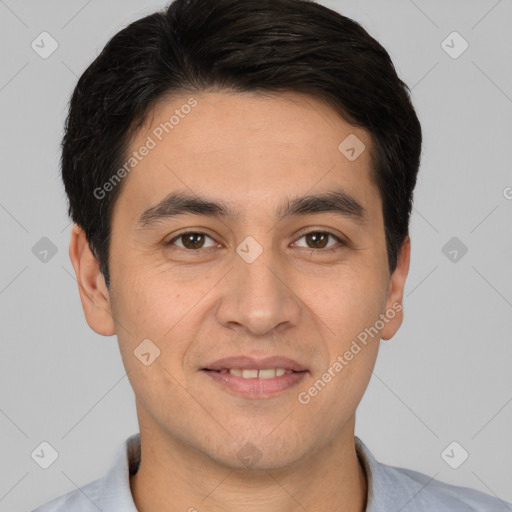 Joyful white young-adult male with short  black hair and brown eyes