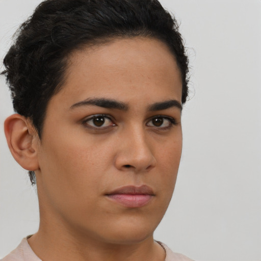 Neutral latino young-adult female with short  brown hair and brown eyes