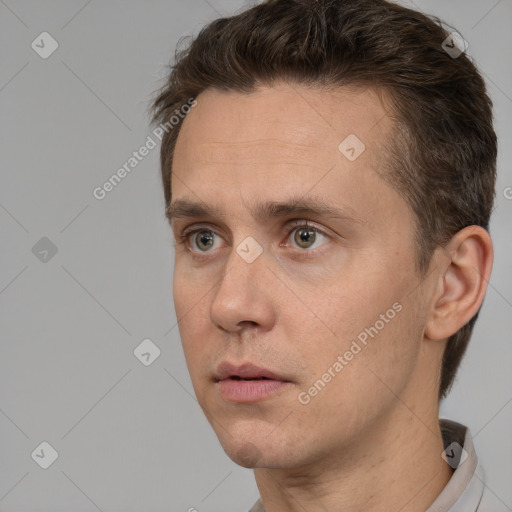 Neutral white adult male with short  brown hair and brown eyes