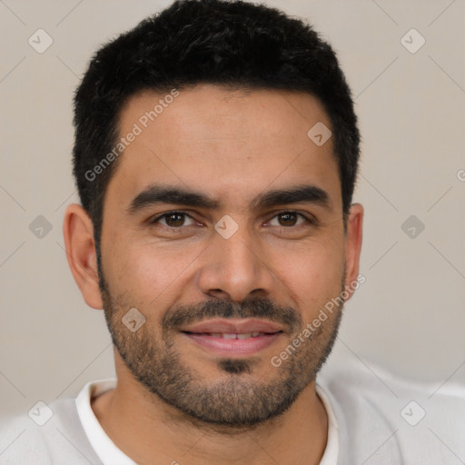 Joyful white young-adult male with short  black hair and brown eyes