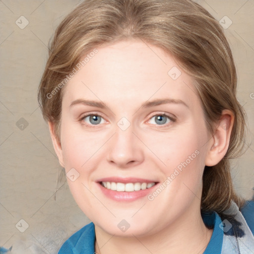 Joyful white young-adult female with medium  brown hair and blue eyes