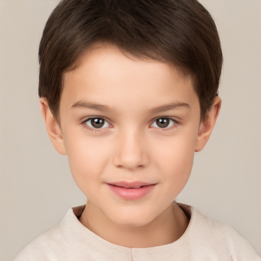 Joyful white child male with short  brown hair and brown eyes