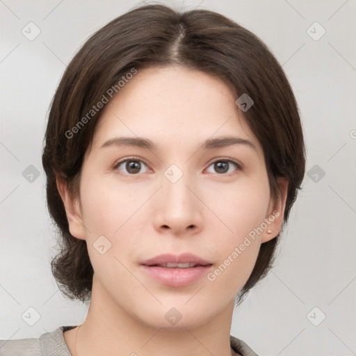 Neutral white young-adult female with medium  brown hair and brown eyes