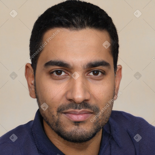 Joyful white young-adult male with short  black hair and brown eyes