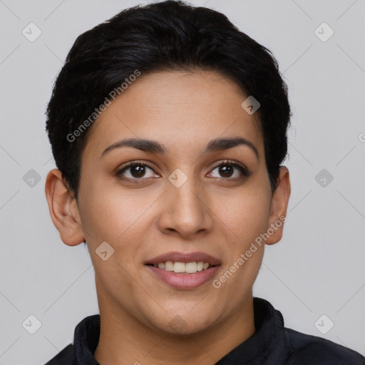 Joyful latino young-adult female with short  black hair and brown eyes