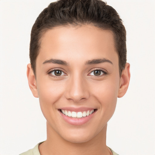 Joyful white young-adult female with short  brown hair and brown eyes