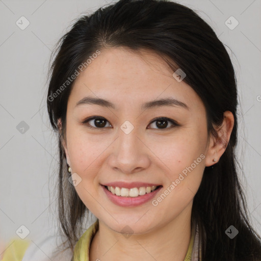 Joyful asian young-adult female with medium  brown hair and brown eyes