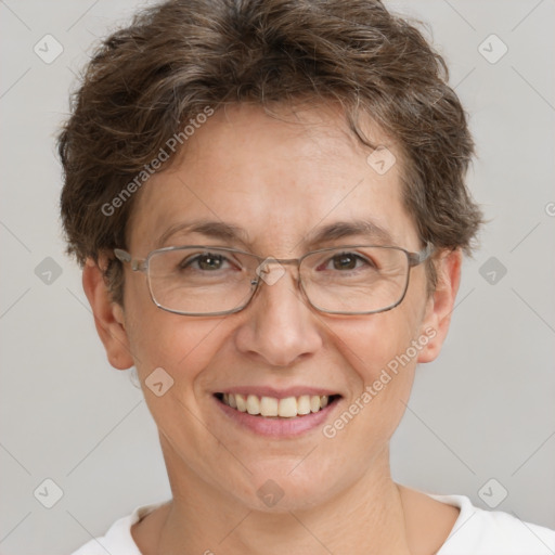 Joyful white adult female with short  brown hair and grey eyes