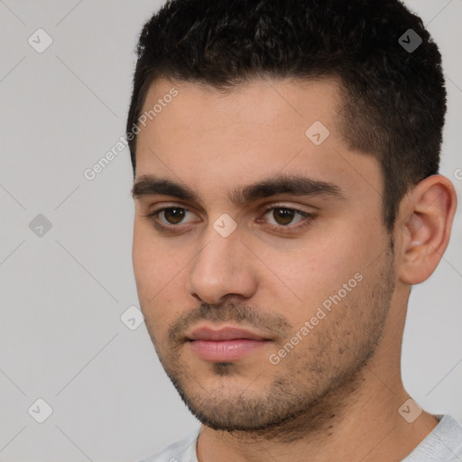 Neutral white young-adult male with short  black hair and brown eyes