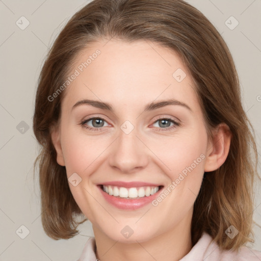 Joyful white young-adult female with medium  brown hair and green eyes