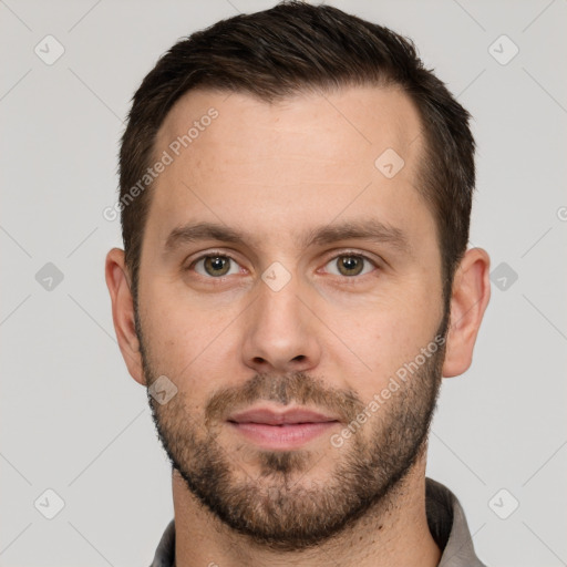 Neutral white young-adult male with short  brown hair and brown eyes