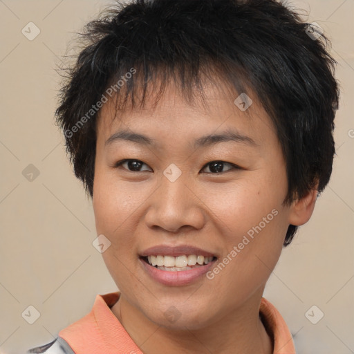 Joyful asian young-adult female with short  brown hair and brown eyes