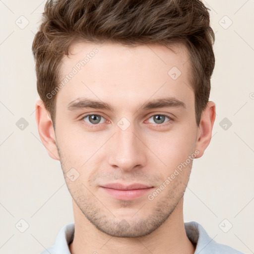 Neutral white young-adult male with short  brown hair and grey eyes