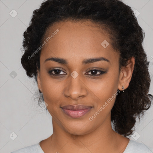 Joyful black young-adult female with medium  black hair and brown eyes