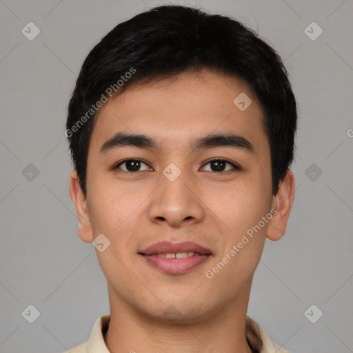 Joyful asian young-adult male with short  black hair and brown eyes