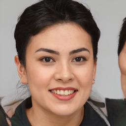 Joyful white young-adult female with medium  brown hair and brown eyes