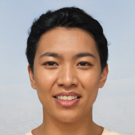 Joyful asian young-adult female with short  black hair and brown eyes