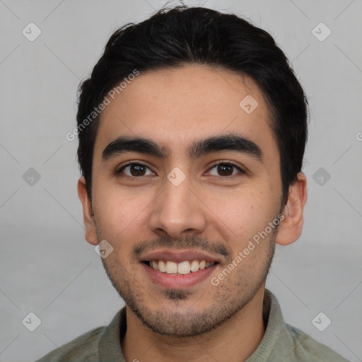 Joyful white young-adult male with short  black hair and brown eyes