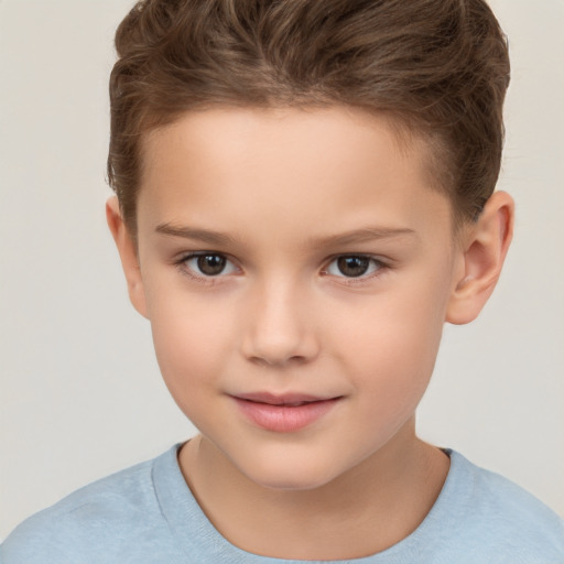 Joyful white child female with short  brown hair and brown eyes