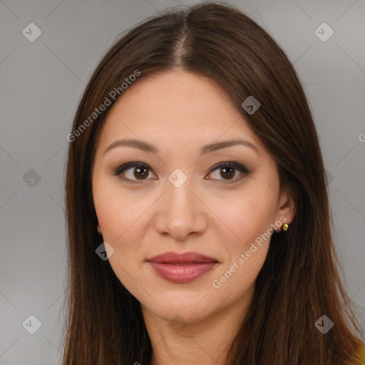 Joyful asian young-adult female with long  brown hair and brown eyes