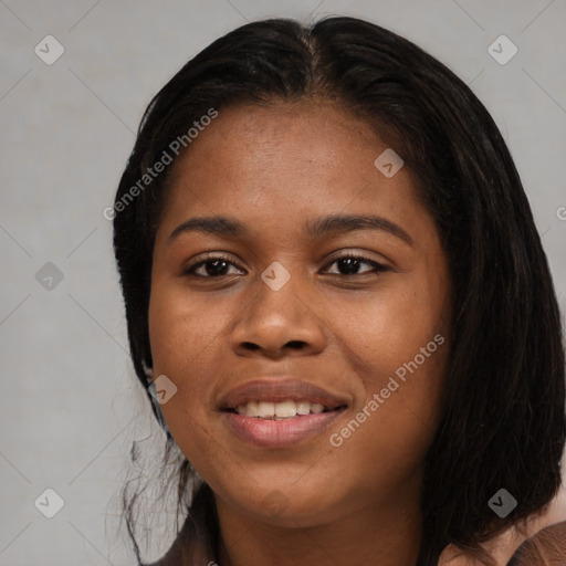 Joyful asian young-adult female with long  black hair and brown eyes