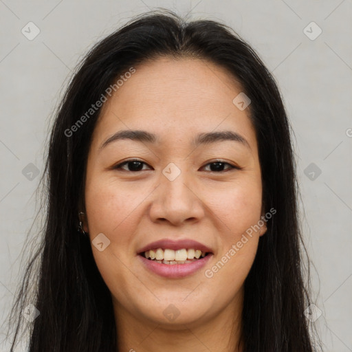 Joyful asian young-adult female with long  brown hair and brown eyes