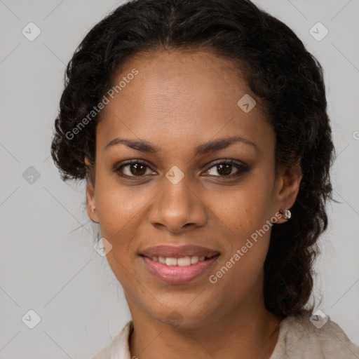 Joyful black young-adult female with long  brown hair and brown eyes