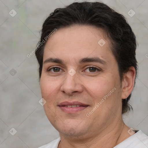 Joyful white adult female with short  brown hair and brown eyes