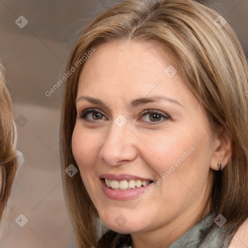 Joyful white adult female with medium  brown hair and brown eyes