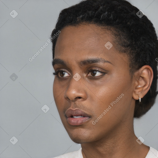 Neutral black young-adult female with short  black hair and brown eyes