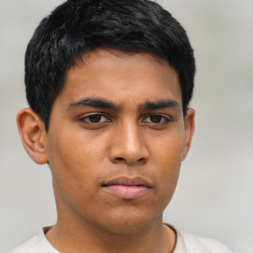 Neutral asian young-adult male with short  brown hair and brown eyes