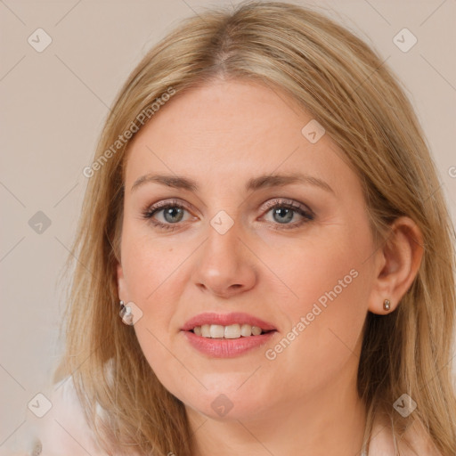 Joyful white young-adult female with medium  brown hair and blue eyes