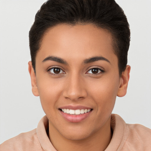 Joyful white young-adult female with short  brown hair and brown eyes