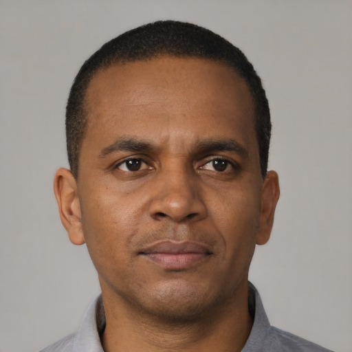 Neutral black young-adult male with short  brown hair and brown eyes