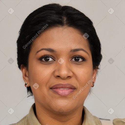 Joyful latino adult female with short  brown hair and brown eyes