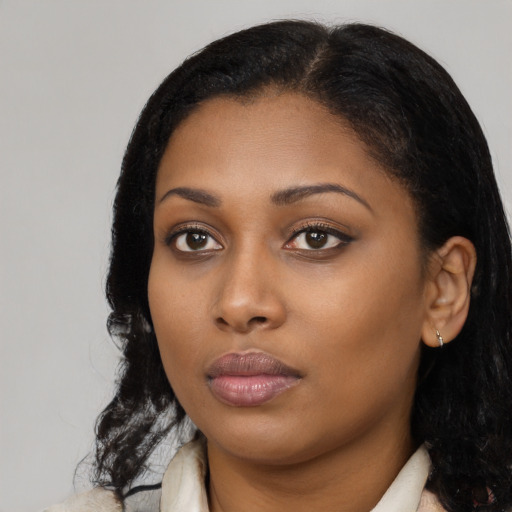 Neutral black young-adult female with long  black hair and brown eyes