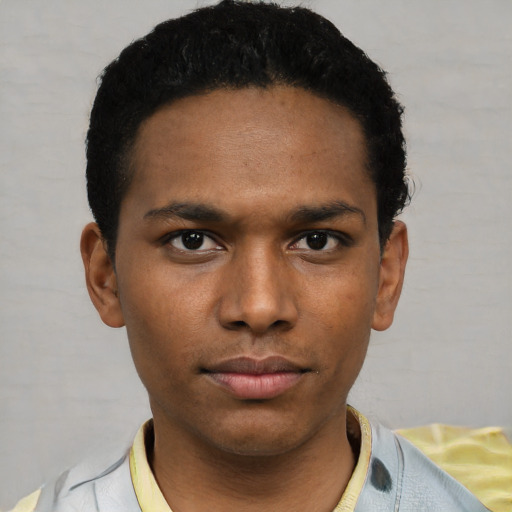 Neutral white young-adult male with short  black hair and brown eyes